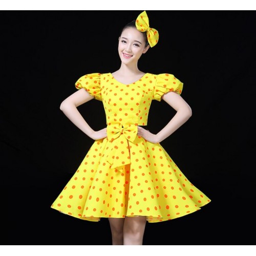 yellow dress with red polka dots